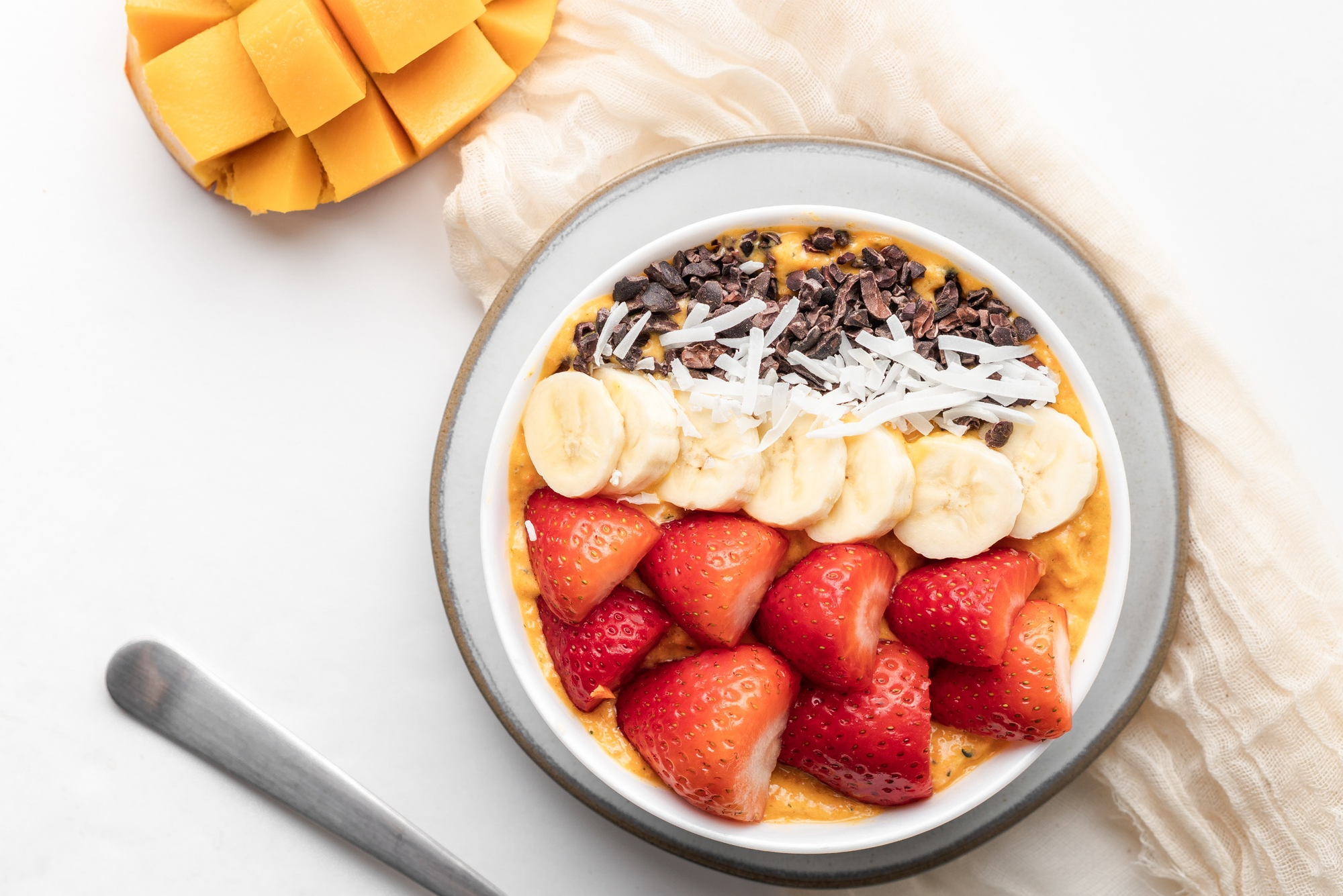 Recette Smoothie Bowl à la Mangue et Noix de Coco